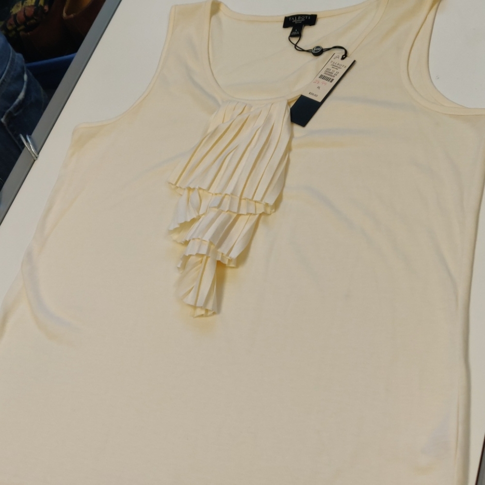 Large cream colored large tank top shirt